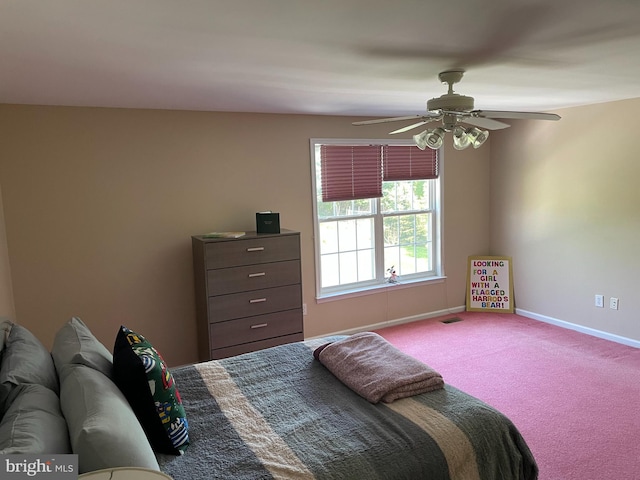 bedroom with ceiling fan and carpet