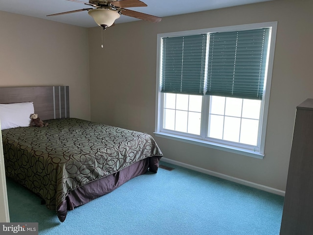 bedroom with carpet flooring and ceiling fan