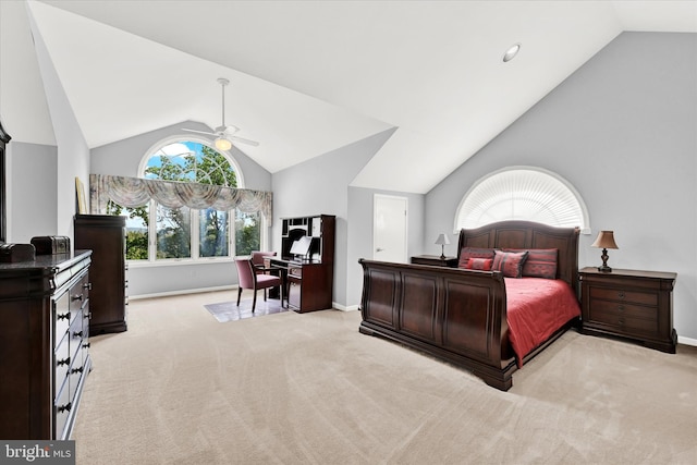 bedroom featuring light colored carpet, ceiling fan, and vaulted ceiling