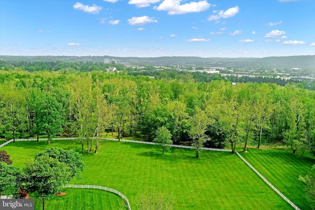 birds eye view of property with a rural view