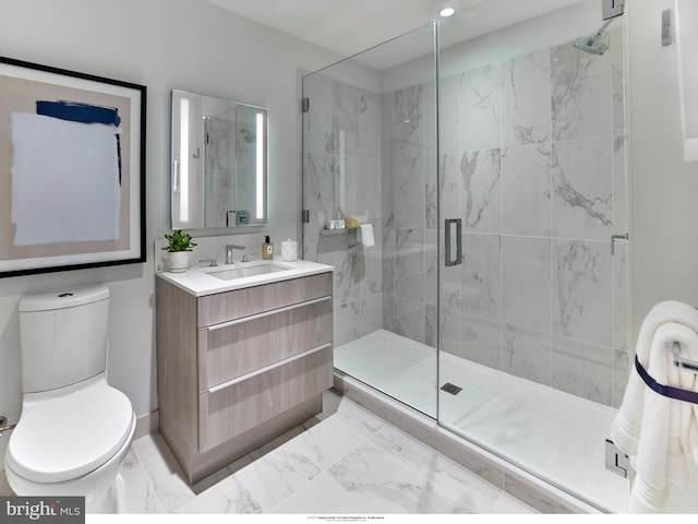 bathroom with oversized vanity, an enclosed shower, toilet, and tile floors