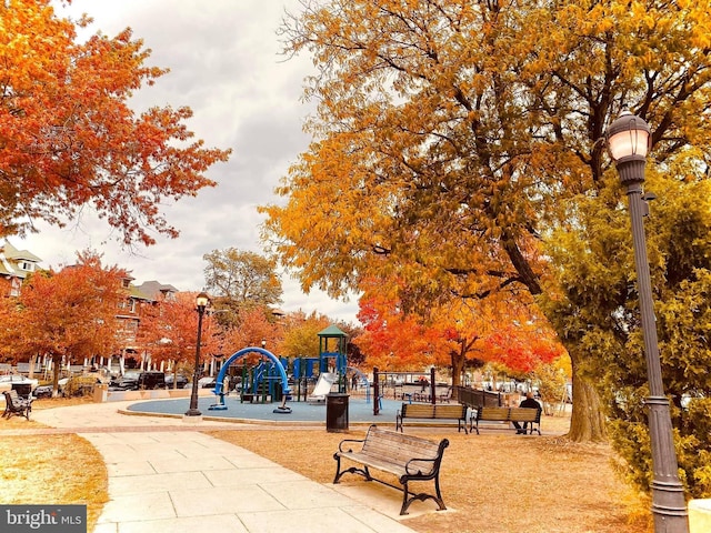 view of property's community with a playground