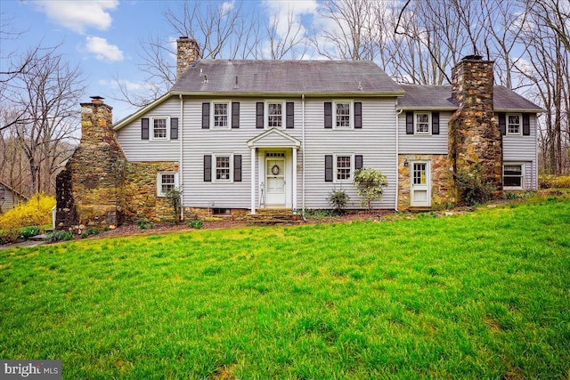 view of front facade with a front lawn