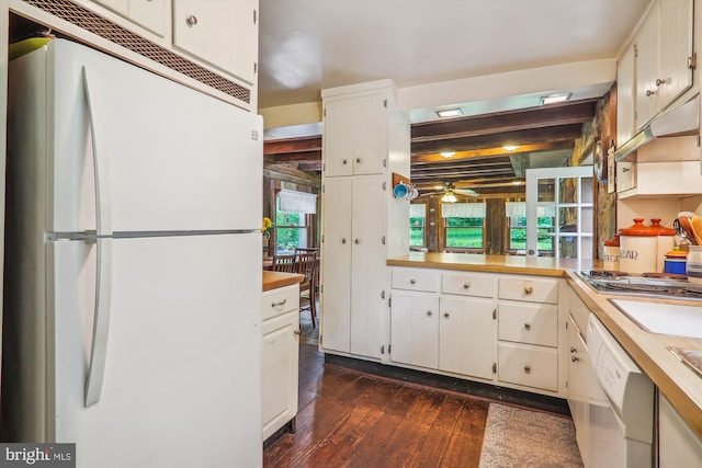 kitchen with white appliances, ceiling fan, dark hardwood / wood-style floors, and white cabinetry