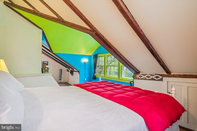 bedroom featuring vaulted ceiling