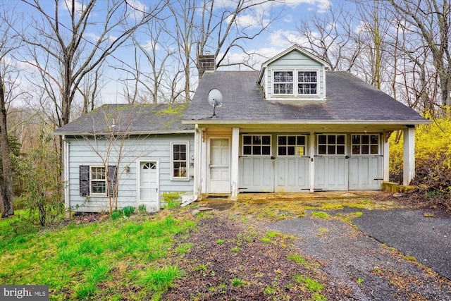 view of new england style home