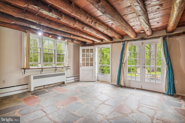 spare room featuring wood ceiling, french doors, radiator, and beamed ceiling