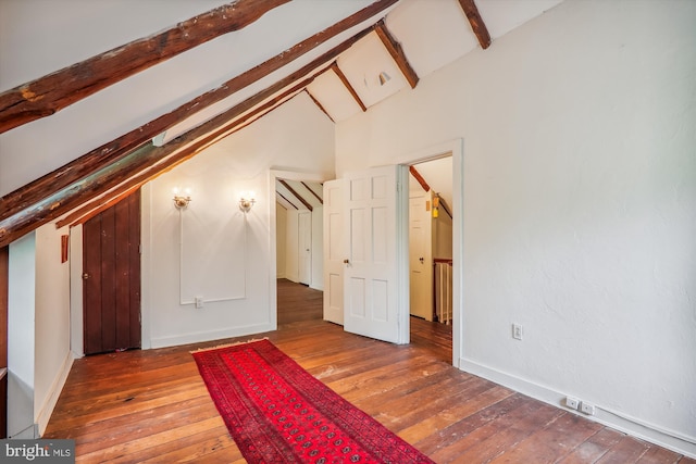 bonus room featuring hardwood / wood-style floors, beamed ceiling, and high vaulted ceiling