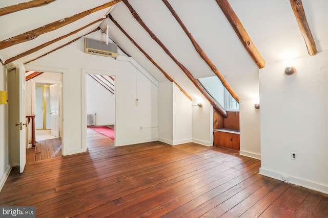 bonus room with hardwood / wood-style floors, radiator, and vaulted ceiling with beams