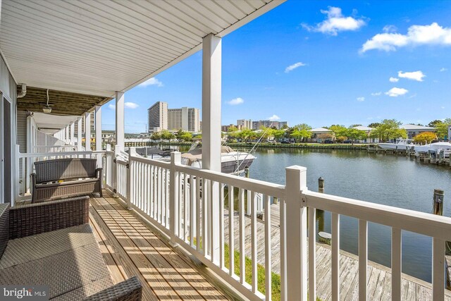 balcony featuring a water view