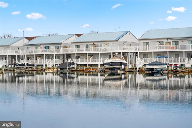 water view featuring a residential view and a boat dock