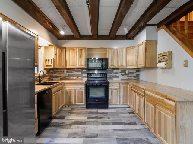 kitchen with sink, black appliances, and light brown cabinets