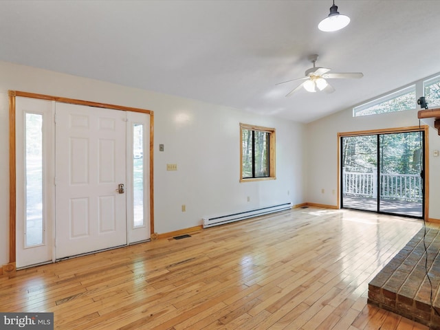 foyer entrance featuring a baseboard radiator, lofted ceiling, ceiling fan, and light hardwood / wood-style flooring