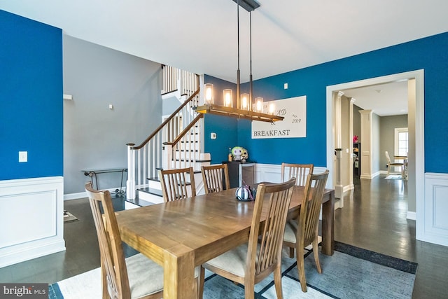 dining area featuring a chandelier