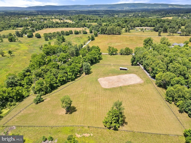 drone / aerial view with a mountain view and a rural view