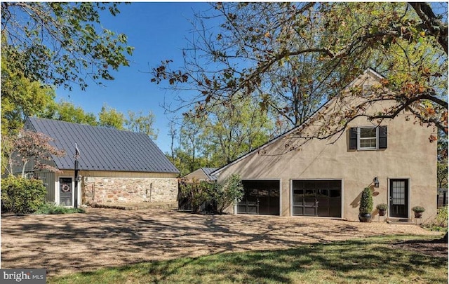 view of property exterior featuring a yard