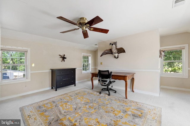 office space with light carpet and ceiling fan