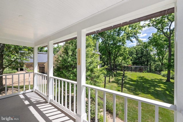 balcony featuring a porch