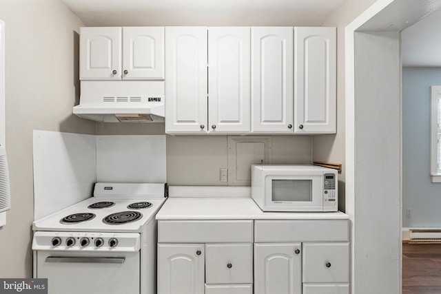 kitchen featuring white cabinetry, hardwood / wood-style floors, white appliances, and ventilation hood