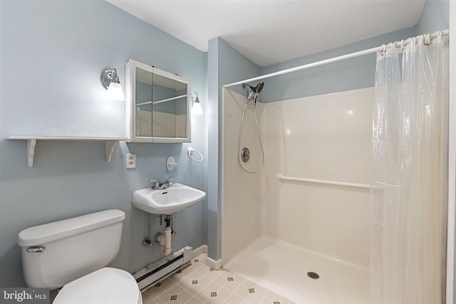 bathroom with a shower with curtain, sink, a baseboard radiator, and toilet