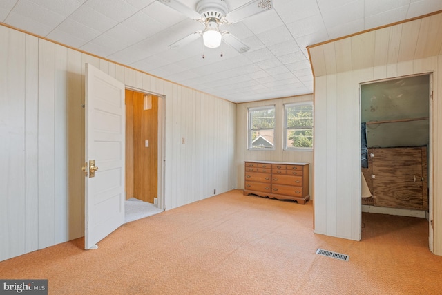 1722 Selma Ave, Halethorpe, MD 21227 - unfurnished bedroom featuring carpet and wood walls