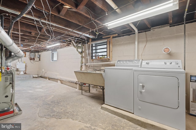1722 Selma Ave, Halethorpe, MD 21227 - below grade area featuring washer and clothes dryer and a sink