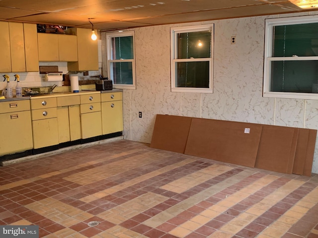 1722 Selma Ave, Halethorpe, MD 21227 - kitchen with yellow cabinets and cream cabinets