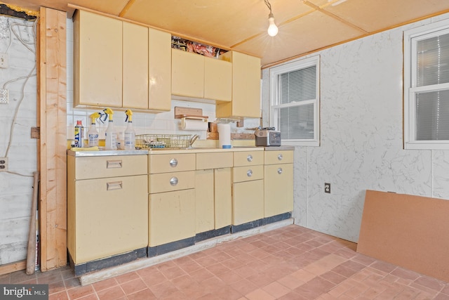 1722 Selma Ave, Halethorpe, MD 21227 - kitchen with cream cabinets and light countertops