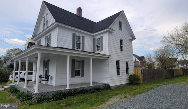 view of home's exterior featuring covered porch