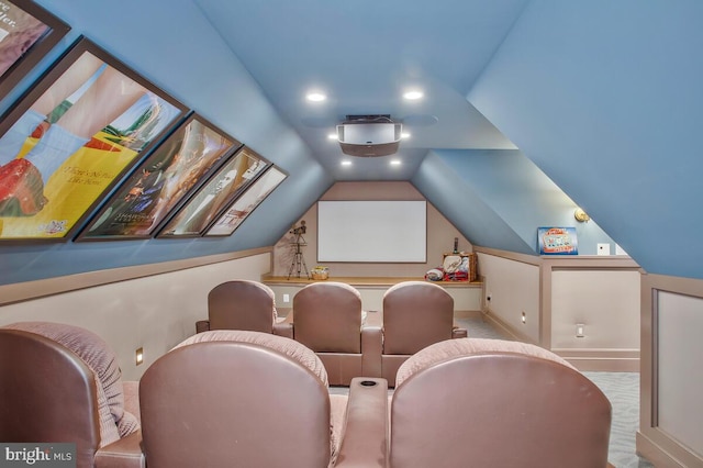 home theater with lofted ceiling