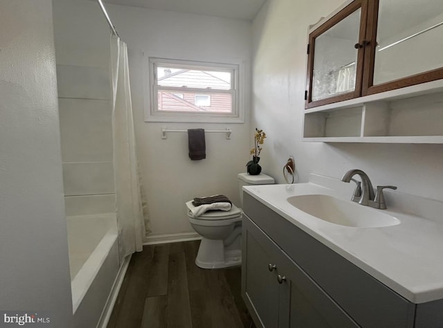 full bathroom with wood-type flooring, vanity, toilet, and shower / bath combination with curtain