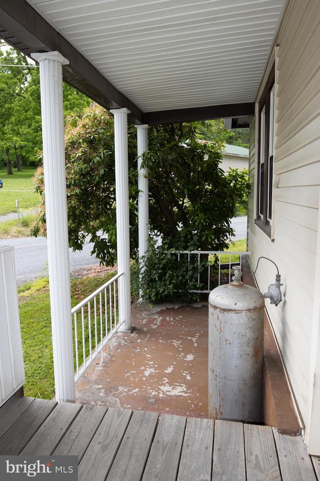 wooden deck featuring covered porch