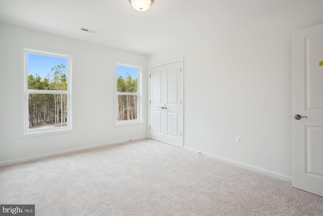 empty room with carpet floors