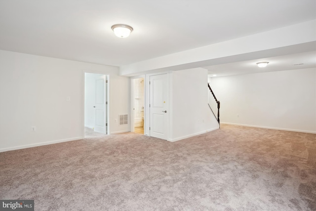 basement with light carpet