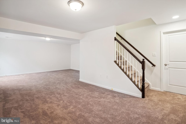 basement featuring carpet flooring