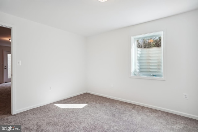 view of carpeted spare room