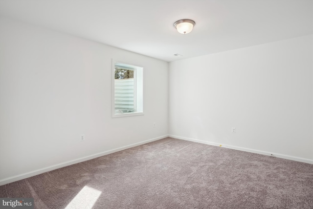 unfurnished room featuring carpet floors