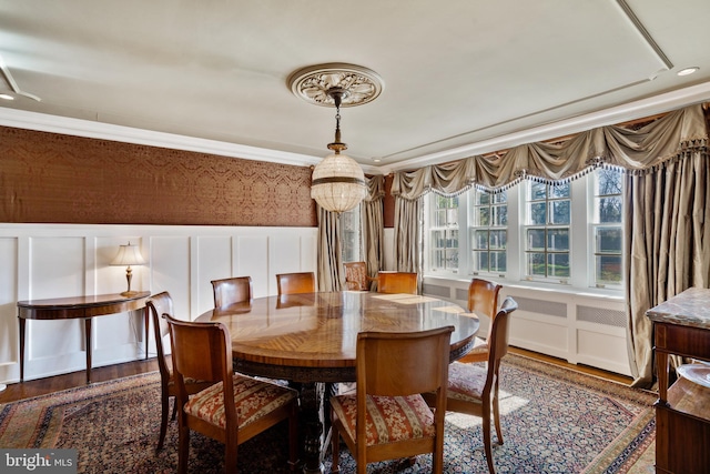 dining area with wood-type flooring