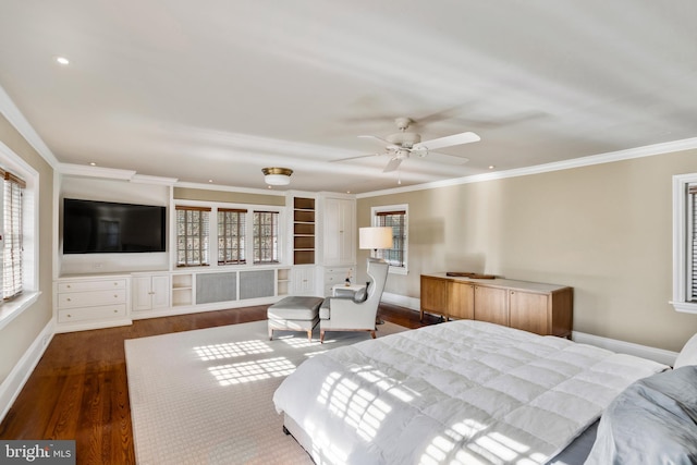 bedroom with ceiling fan, dark hardwood / wood-style flooring, and crown molding