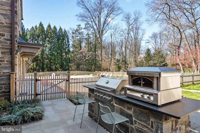 view of patio with area for grilling