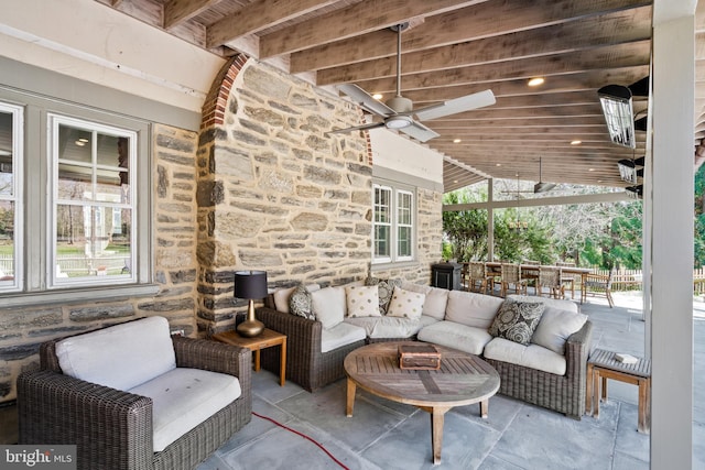 view of patio / terrace with ceiling fan and an outdoor hangout area