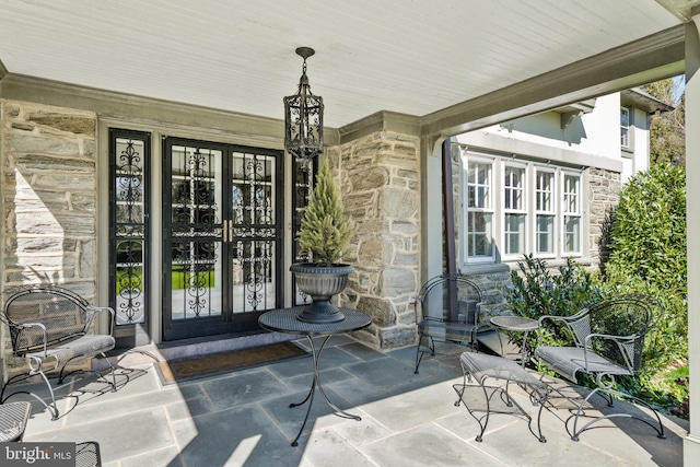 entrance to property featuring french doors