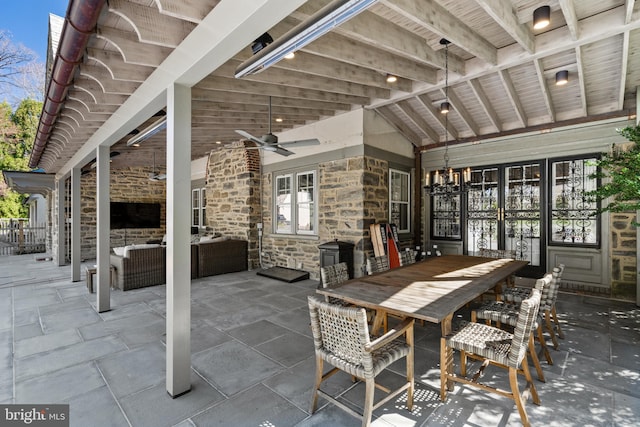 view of terrace featuring ceiling fan