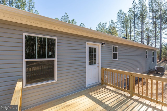 wooden deck featuring central AC