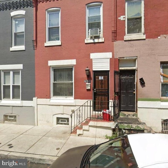 view of front of home featuring cooling unit