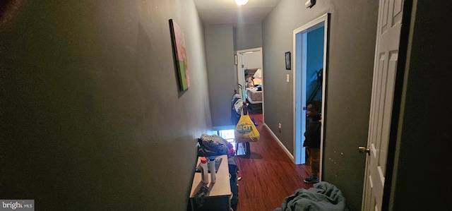 hallway featuring hardwood / wood-style flooring