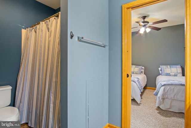 bedroom with ceiling fan and carpet