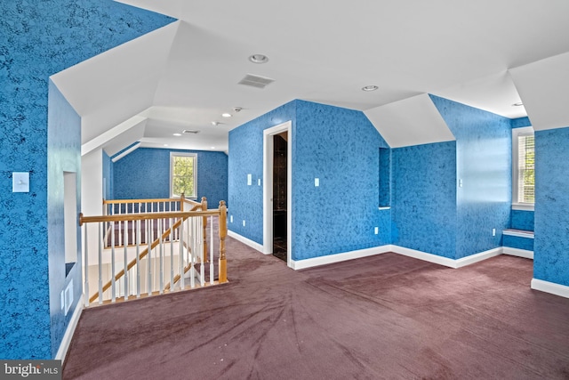 bonus room featuring lofted ceiling