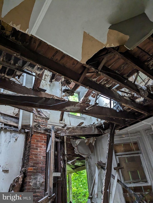 details featuring beam ceiling and wood ceiling