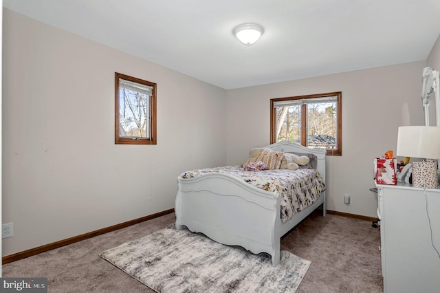 bedroom with light carpet